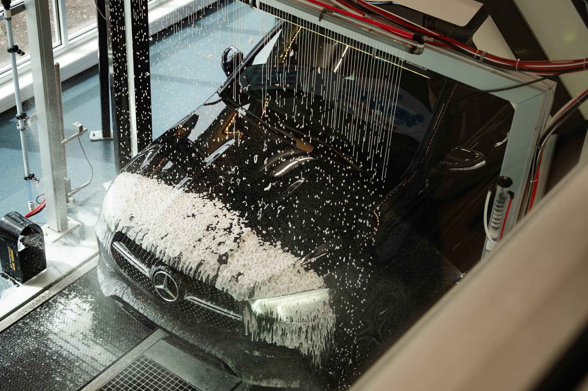 The high-pressure sprayers and wash chemistry that clean each vehicle at The Flow
